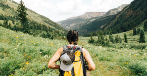 a woman hiking in nature