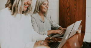 two women working on their family business