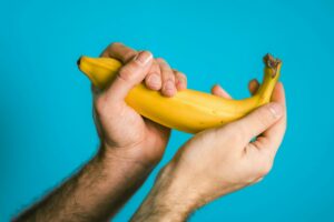 person holding banana