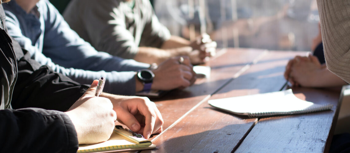 people having a meeting in a conference room