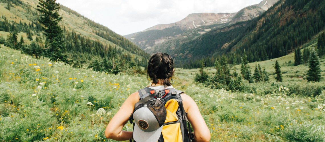 a woman hiking in nature