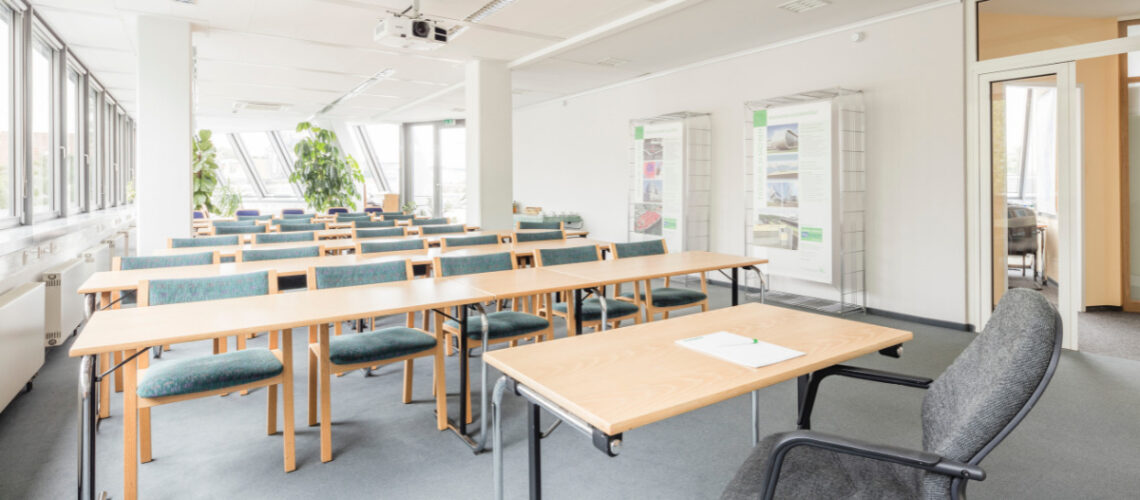 empty classroom of desks and chairs