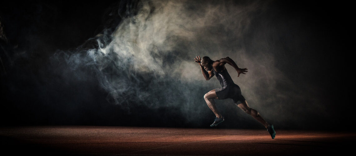 Athlete running on a track