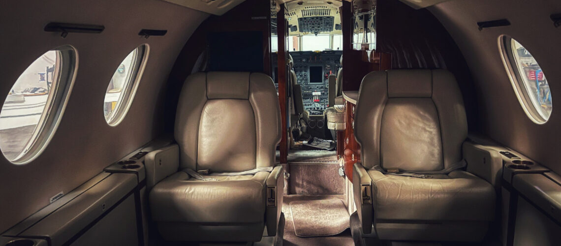 2 seats on the inside of a private jet