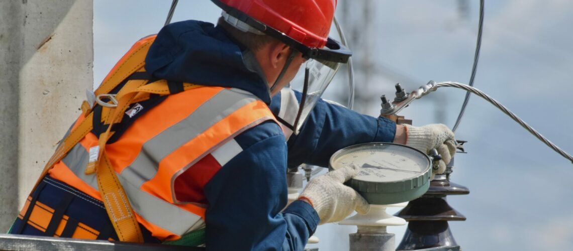 Electrician working on a line