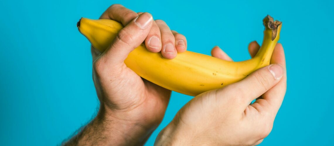 person holding banana